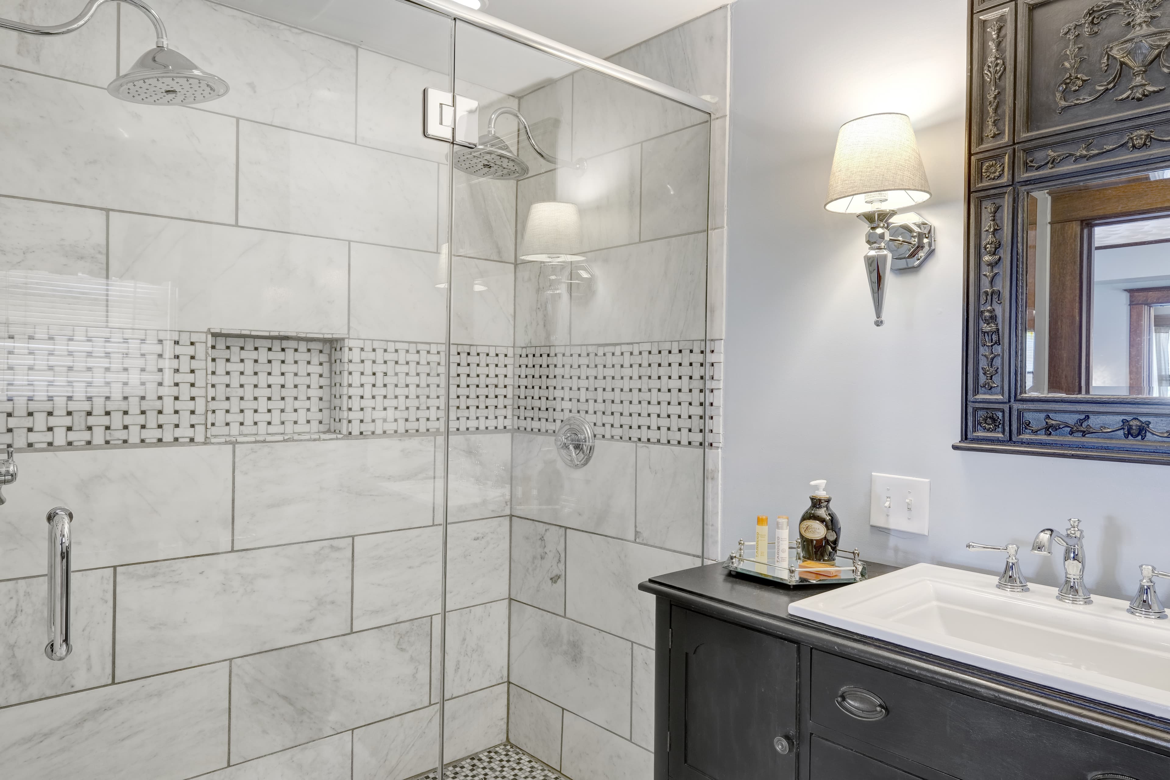 Ensuite bath with two person marble shower