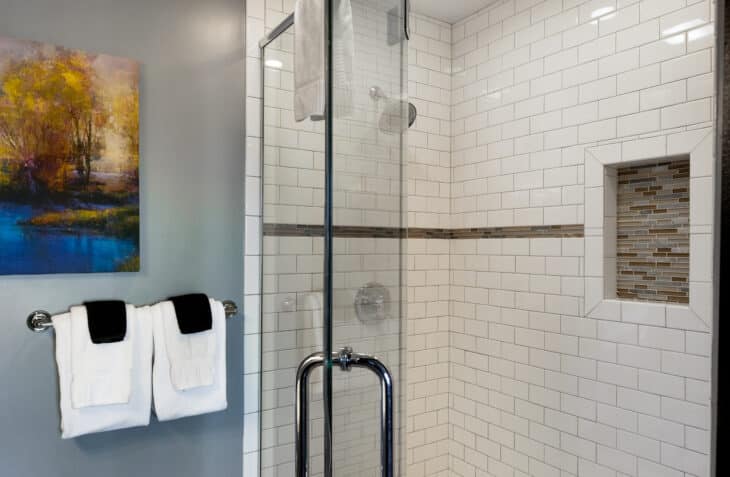  Sir Lancelot Suite bath with two person tiled shower with all glass doors.