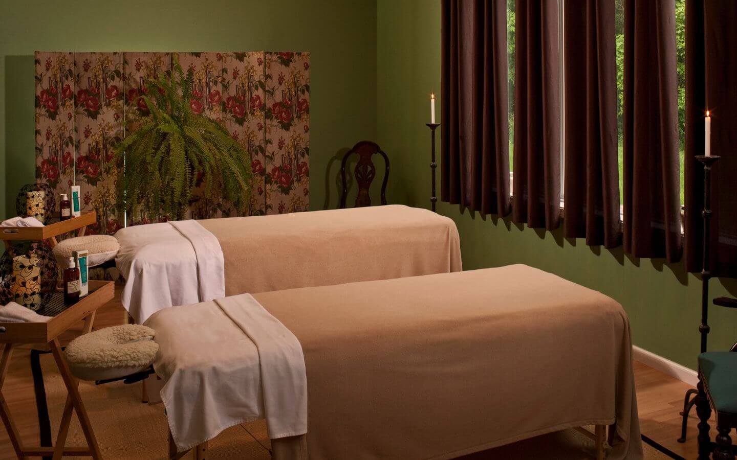 two side-by-side massage tables at castle in the country